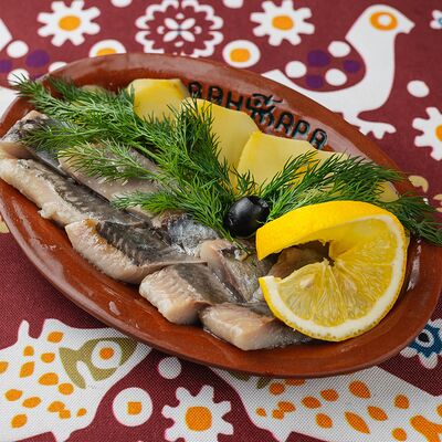 Сельдь с отварным картофелем в Хванчкара по цене 610 ₽