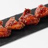 Крылья куриные под соусом BBQ 4 шт в Hungry Wolf Bar по цене 575
