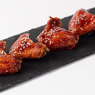 Крылья куриные под соусом BBQ 4 шт в Hungry Wolf Bar по цене 575 ₽