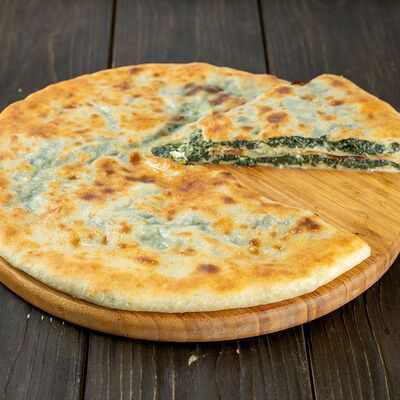 Пирог с сыром и шпинатом в Осетинские пироги Вкусно Пироги по цене 1000