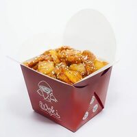 Свинина с ананасами в кисло-сладком соусе в Woki