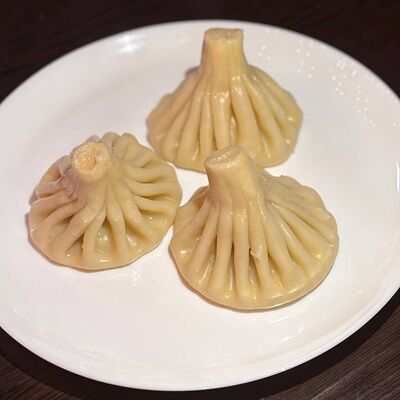Хинкали отварные с курицей в Маркет гиро и скепасти по цене 360 ₽