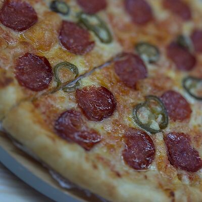 Пицца Пепперони в Грузинский дом по цене 652 ₽