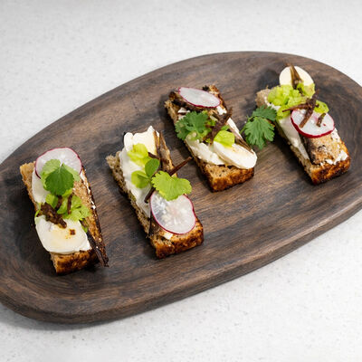 Кростини с рижскими шпротами в Муссоны по цене 310 ₽