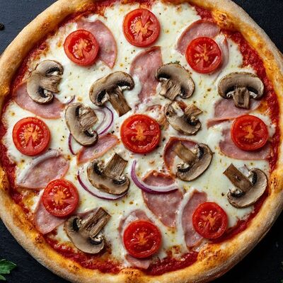 Пицца По-домашнему в Бизон по цене 720 ₽