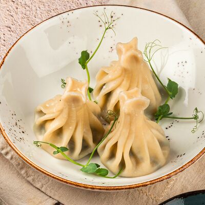 Хинкали с бараниной в Омар Хайям Европа и Азия по цене 380 ₽