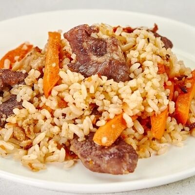 Узбекский плов с говядиной из казана в Bazar по цене 229 ₽