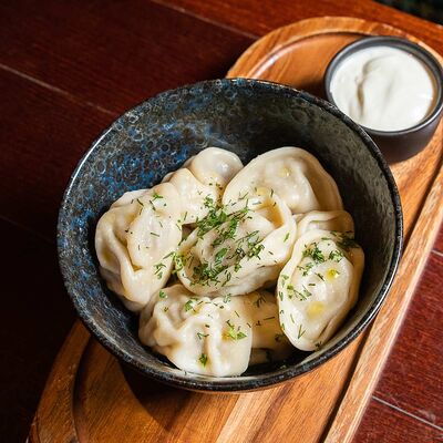 Пельмени Русские со сметаной в Ресторан Мариус по цене 1020 ₽