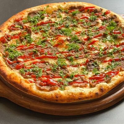 Стейк Пицца в Роллофф по цене 1499 ₽