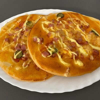 Пицца с соленым огурчиком в Твой Пекарь по цене 85 ₽