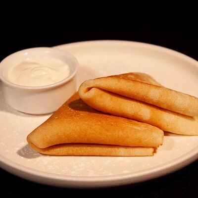 Блинчики со сметаной в Avenue Food 87 по цене 220 ₽