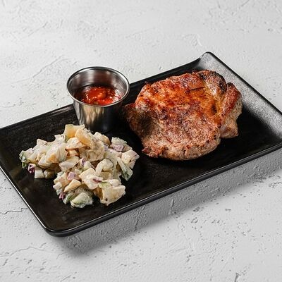 Стейк из свинины в Гриль-паб ЕрмолаевЪ по цене 625 ₽