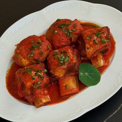 Томленые ребрышки с картофелемв Nest по цене 980 ₽