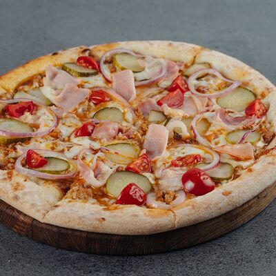 Чизбургер-пицца в В угли по цене 750 ₽