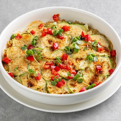Запеканка из кабачков с кускусом и овощами в Магадан по цене 590 ₽