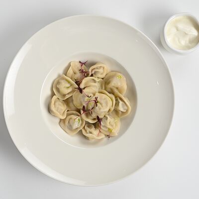 Пельмени с говядиной и свининой в Болконский по цене 500 ₽