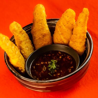 Куриные стрипсы в Mexico cantina по цене 470 ₽