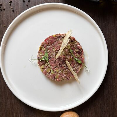 Тартар из говядиныв PizzAmore по цене 1200 ₽