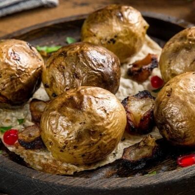 Картофель с курдюком на углях в Вкусный шашлык и не только по цене 430 ₽