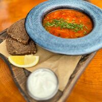 Солянка с рулькой и копченостями в Крылья Гастробар
