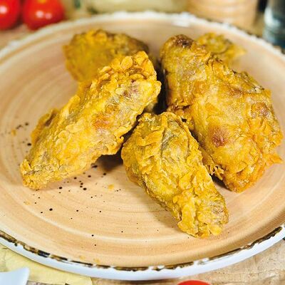 Острые куриные крылья в панировке в Пиццерия Перчик по цене 395 ₽