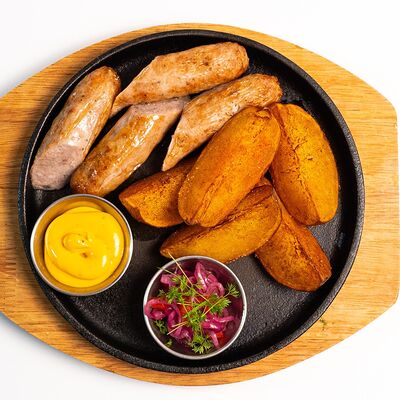 Домашние колбаски в Harats pub по цене 690 ₽