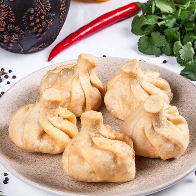Хинкали с креветками жаренные в Тамада по цене 950 ₽