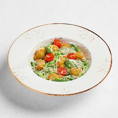 Салат Цезарь с байтсами в ПиццаФабрика по цене 435 ₽