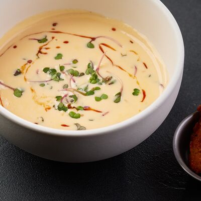 Сырный суп с курицей в По Чесноку по цене 555 ₽