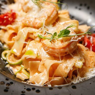 Паста с креветками в Овертайм по цене 770 ₽