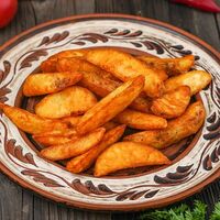 Картофельные дольки в Аджика