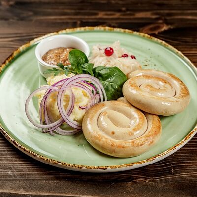 Колбаска куриная улитка 2 шт. в Гастробар Феллини по цене 790 ₽