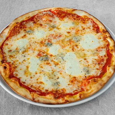 Пицца четыре сыра с томатным соусом в Bocconcino по цене 1170 ₽