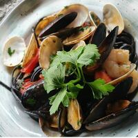 Спагетти с чернилами каракатицы в Perbacco Italian Restobar