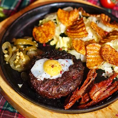 Бифштекс в Harats pub по цене 720 ₽