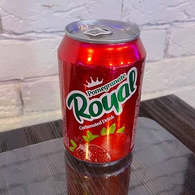 Гранатовый газированный напиток Royal в WORLD MANGAL CLUB по цене 275 ₽