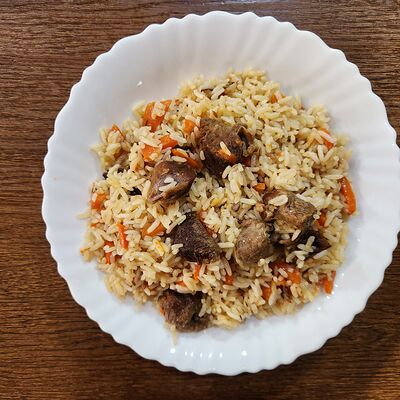 Плов с говядиной в Марио по цене 350 ₽