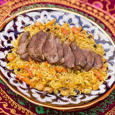 Плов узбекский праздничный в Навруз по цене 470 ₽