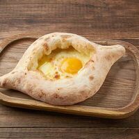 Хачапури по-аджарски в Лари