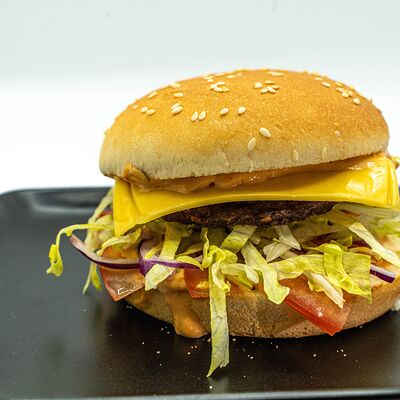 Бургер маленький сытный в San-Pizzerino по цене 439 ₽