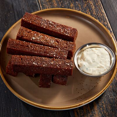 Чесночные гренки в ЕрмолаевЪ Охота и Рыбалка по цене 250 ₽