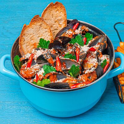 Мидии в соусе арабьята с пармезаном в Pacific по цене 1200 ₽