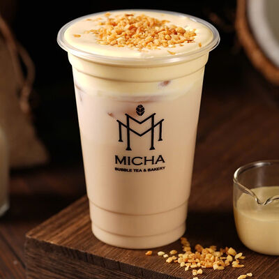 Чёрный чай с брюле кремом и кокосом (без тапиоки) в Micha Bubble Tea & Bakery по цене 495 ₽