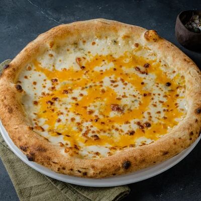 4 сырав PizzAmore по цене 1150 ₽