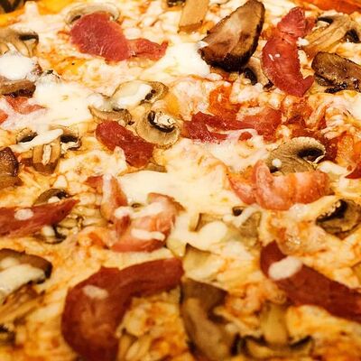 Пицца Мясное ассорти в Mangal House по цене 999 ₽