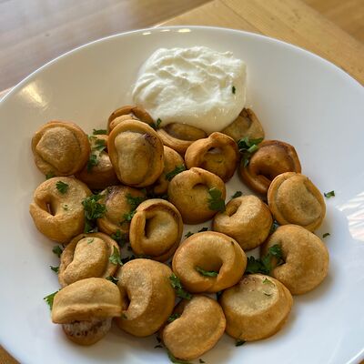 Пельмени мясные жареные в Baikallove по цене 360 ₽