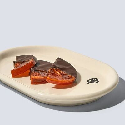 Апельсиновая долька в шоколаде в Masa Madre по цене 110 ₽