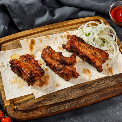 Мощные свиные рёбрышки в Армянская кухня по цене 899 ₽