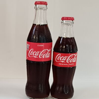 Coca-Сola в стекле в Огонёк по цене 100 ₽