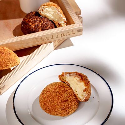 Шу со сливками в Italiani по цене 130 ₽